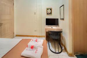 Wisma Anggrek Syariah Mitra Reddoorz