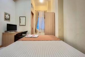 Wisma Anggrek Syariah Mitra Reddoorz