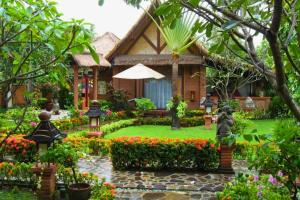 Raveena 1 BR Classic Garden Room Double ZN139 - 4hvězdičkové hotely ve městě Mangsit