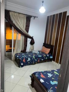 Martil Bel appartement lumineux, situé à seulement 15 minutes à pied et 5 minutes en voiture de la plage, idéal pour les vacances en famille ou entre amis