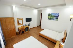 Phòng Deluxe 4 người (Deluxe Quadruple Room)
