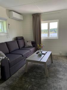 Stuga med strandtomt i Smålands natursköna miljö