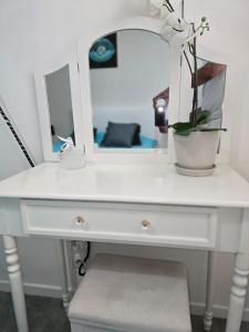 Appartements Sejour a Orly a 12 minutes d-Orly Airport et de Paris 14eme - AUX REFLETS PASTELS : photos des chambres