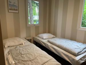 Chalets Evasion au coeur de l'Alsace - Bungalow familial pour 5 : photos des chambres