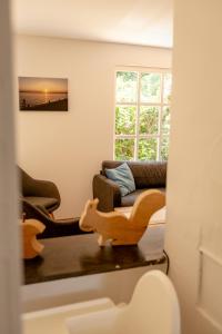 Gemütliches Holzhaus am Meer