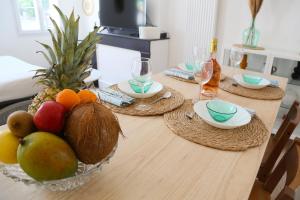 Appartements L'Ethnique 7p - Climatisation - Jardin - Parking - Salle de Sport : photos des chambres