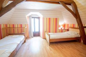 Maisons de vacances La petite maison sur la colline : photos des chambres