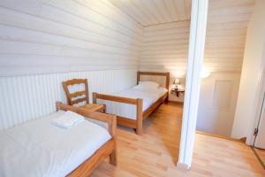 Maisons de vacances La petite maison sur la colline : photos des chambres