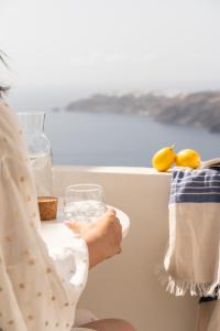 Premium Quadruple Room Caldera View with Outdoor Mini Plunge Pool room in Rocabella Santorini Hotel & Spa