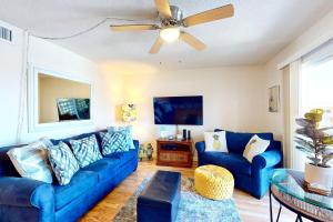 Just Cocoa Beachy - Cozy beachside condo with pool and beach access