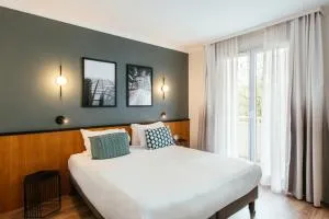 拉德芳斯乐帕克爱达格公寓式酒店 - 库尔布瓦