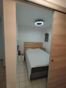 Appartements Rez-de-jardin climatise : photos des chambres