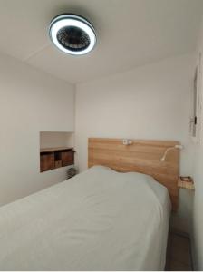Appartements Rez-de-jardin climatise : photos des chambres