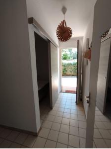 Appartements Rez-de-jardin climatise : photos des chambres