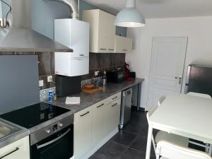 Appartements Le Central - wifi Netflix - Coeur de ville : photos des chambres