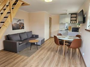 Apartament pod laskiem