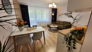 Trzypokojowy apartament z parkingiem