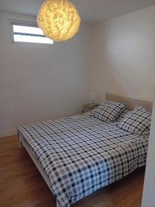 Appartements Petite maison avec jardin : photos des chambres