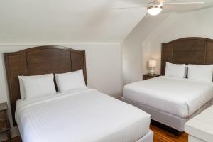 Deluxe Queen Room with Two Queen Beds room in Inn on Ursulines a French Quarter Guest Houses Property