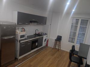 Appartements TRES BEL APPARTEMENT AUX PIEDS DE LA GARe : photos des chambres