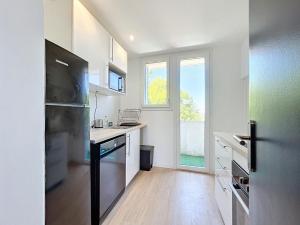 Appartements T3 Aurore 64 m2 SmartTV : photos des chambres