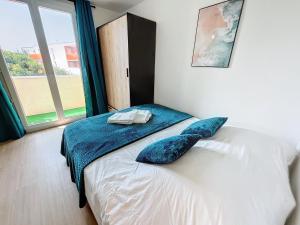 Appartements T3 Aurore 64 m2 SmartTV : photos des chambres