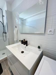 Appartements T3 Aurore 64 m2 SmartTV : photos des chambres