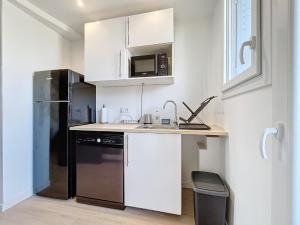 Appartements T3 Aurore 64 m2 SmartTV : photos des chambres