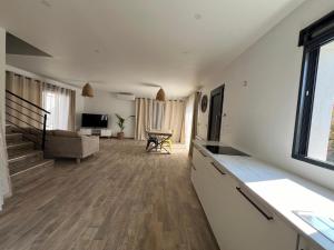 Villas Maison neuve 4 chambre avec jacuzzi : photos des chambres