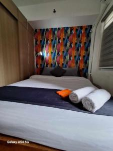 Cozy 1 Bed Unit WIFI in Grace Residences Taguig City