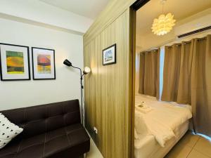 1BR Condotel with Balcony at FAME Residences #FM42