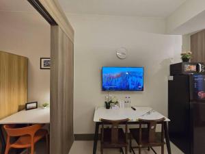 1BR Condotel with Balcony at FAME Residences #FM44