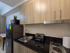 1BR Condotel with Balcony at FAME Residences #FM45