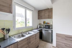 Appartements Le Poincare, Proche Gare RER, Parking, Arrivee autonome : photos des chambres