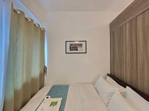 1BR Condotel with Balcony at FAME Residences #FM49