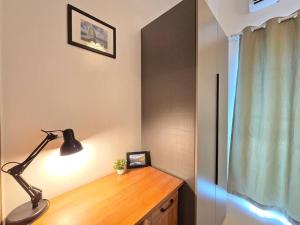 1BR Condotel with Balcony at FAME Residences #FM49