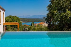 Villa 4 with Pool Soline, Krk, 280 m from beach, by 4Villas