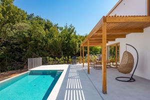 Villa 4 with Pool Soline, Krk, 280 m from beach, by 4Villas