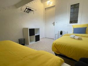 Maisons de vacances Maison Familiale avec Jardin : photos des chambres
