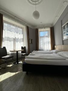 Triple Room With Private Shower and Shared Toilet room in Hotel Kieler Hof
