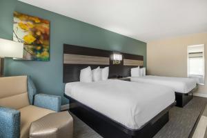 Queen Room with Two Queen Beds - Non-Smoking room in Prime Inn & Suites Poteau