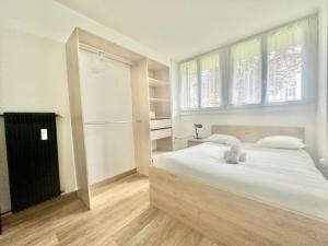 Appartements Le Monochrome, spacieux et adapte aux familles : photos des chambres