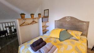 Appartements Au calme en vieille ville - Proche lac - Ambiance esprit brocante : photos des chambres