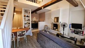 Appartements Au calme en vieille ville - Proche lac - Ambiance esprit brocante : photos des chambres