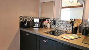 Appartements Au calme en vieille ville - Proche lac - Ambiance esprit brocante : photos des chambres