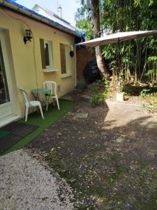 Appartements Charmante petite maison a 15 min de Paris : photos des chambres