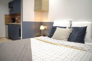 Appartements Studio 1 - Appart-hotel avec terrasse, CLIM, WIFI - TU ELLETA : photos des chambres