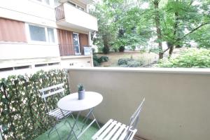 Appartements L-Escapade - Hypercentre 5- RER C Paris - Orly 15 min : photos des chambres