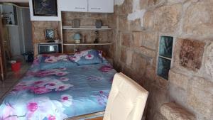 Appartements Appartement chaleureux dans une maison en pierre : photos des chambres