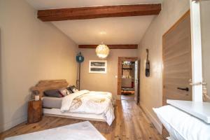 Appartements chalet de montagne Style sur le Quai saint Laurent et Bastille : photos des chambres